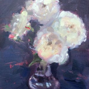 white roses in a glass vase